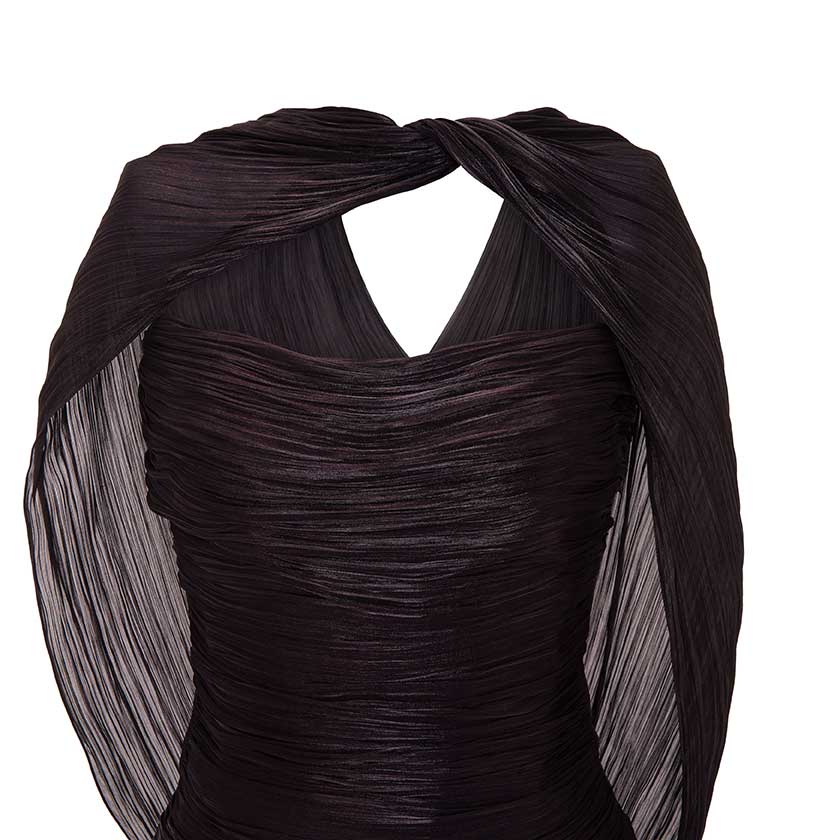 HAND-PLEATED SILK FABRIC AND CREPE SKIRT WITH A DETACHABLE CAPE