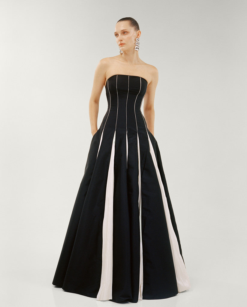 STRAPLESS A-LINE TAFFETA DRESS WITH PIPING PLEATED DETAIL