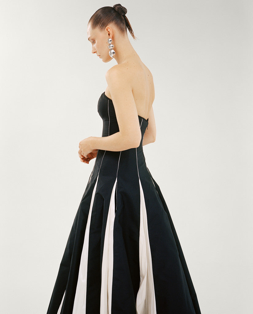 STRAPLESS A-LINE TAFFETA DRESS WITH PIPING PLEATED DETAIL