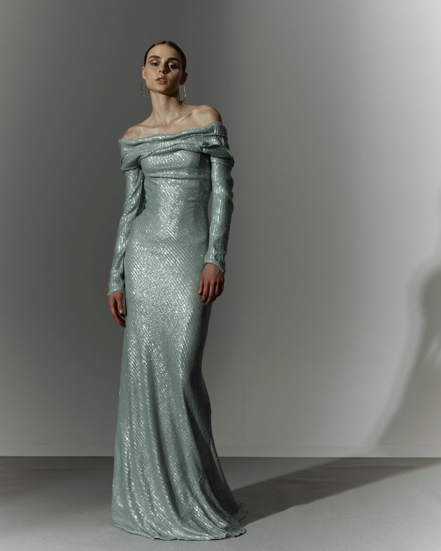 Long sleeve, off shoulder draped sequin gown with soft wires on top