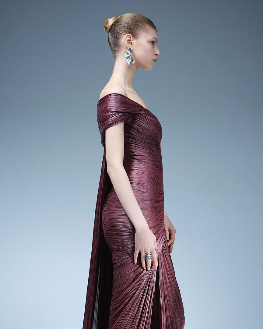 PLEATED OFF-SHOULDER GOWN WITH DETACHABLE CAPE